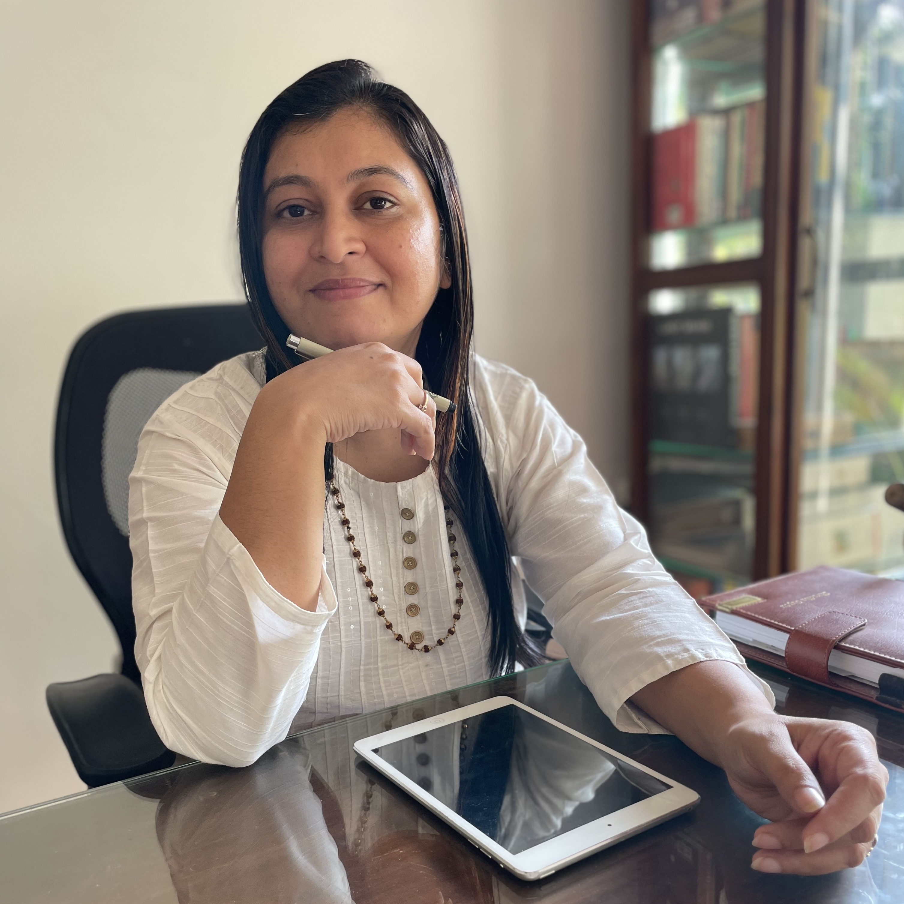 Shradha Gupta astrologer at her desk